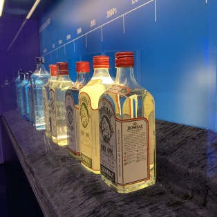 Display of bottles design from the history of Bombay Sapphire
